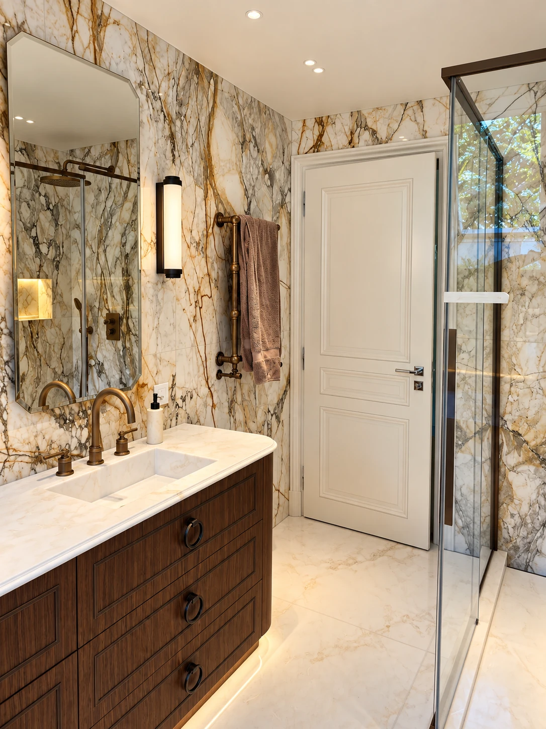 Salle de bain en marbre avec lavabo, sèche-serviettes et douche vitrée